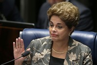 Suspended Brazilian President Dilma Rousseff waves goodbye after her impeachment trial at the Federal Senate in Brasilia, Brazil, Monday, Aug. 29, 2016. (AP Photo)