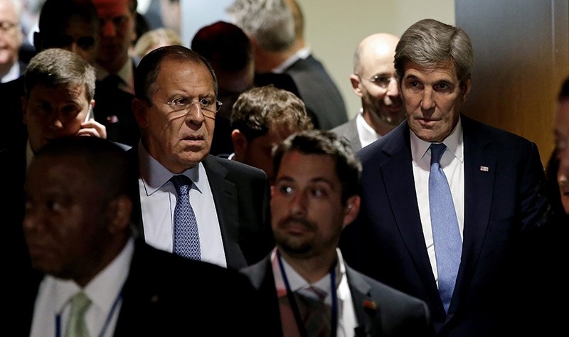  A file picture dated 22 September 2016 shows John Kerry (R), US Secretary of State and Sergei Lavrov (C), Russian Minister of Foreign Affairs exiting after a meeting (EPA Photo)