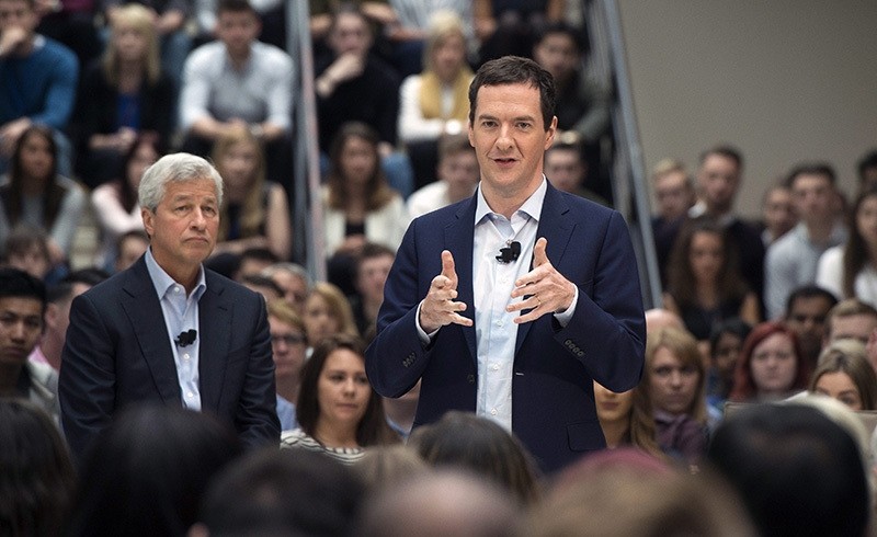 Chancellor of the Exchequer George Osborne (R) speaks with JP Morgan CEO Jamie Diamon (L) during an event on the United Kingdom's membership of the European Union (EU) in Bournemouth, Britain, 03 June 2016. (EPA Photo)