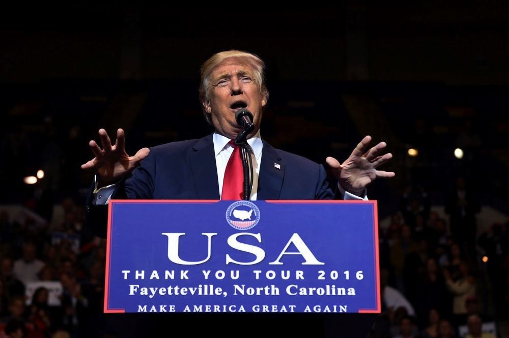 US President-elect Donald Trump speaks at the Crown Coliseum in Fayetteville, North Carolina on Dec. 6, during his USA u2018Thank Youu2019 tour.