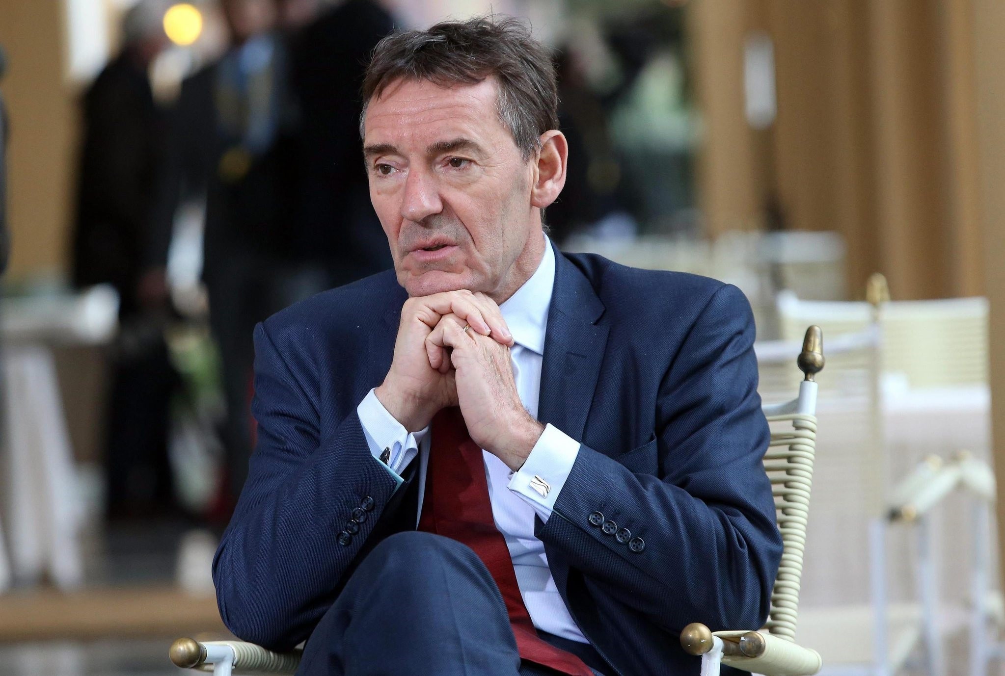 UK gov't suffers first resignation under May after reported row over