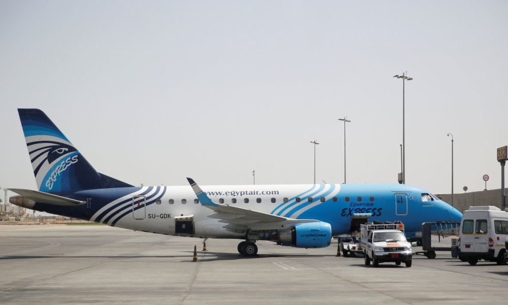 Workers service an EgyptAir flight at the Cairo airport, May 21.