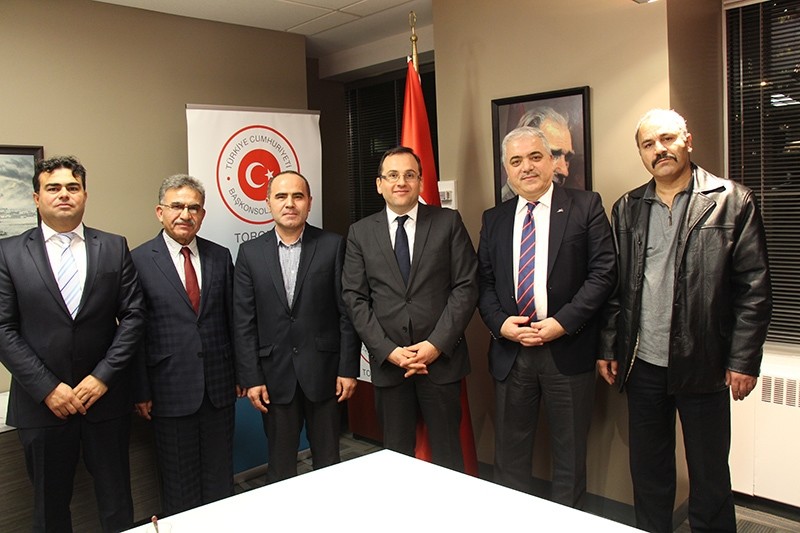 Members of KATu0130B visited Turkey's Consul General Erdem u015een (Third in the right) in Toronto (AA Photo)
