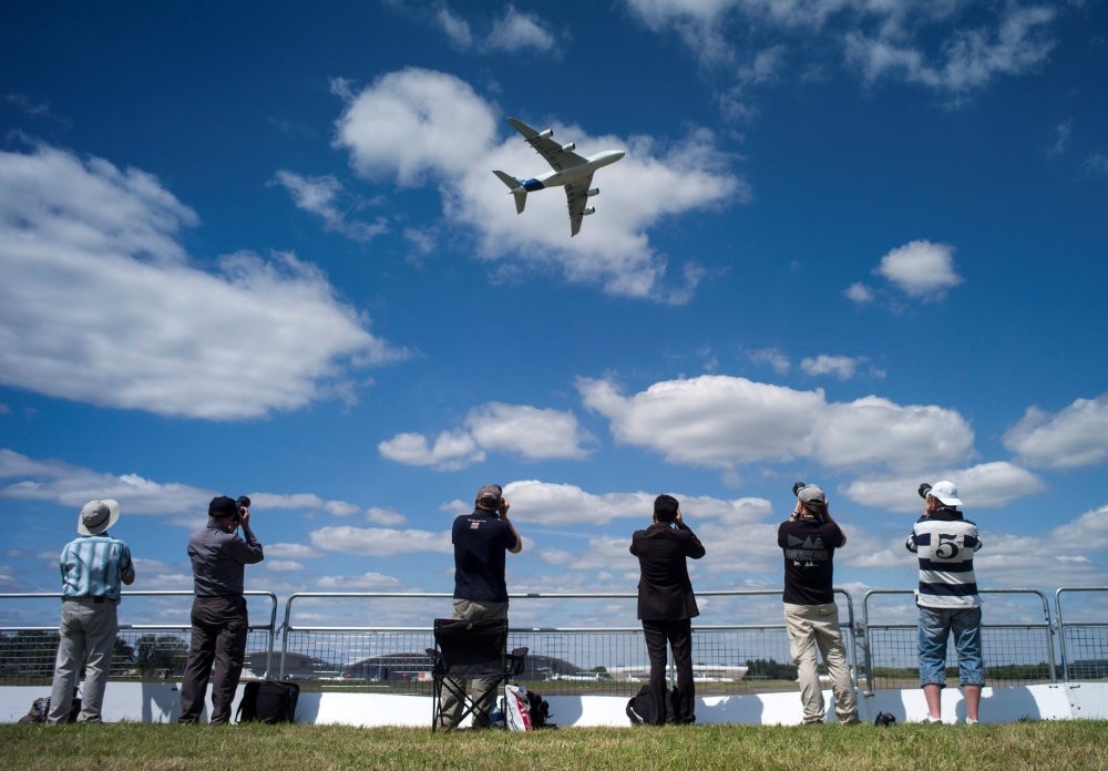 An Airbus A380 aircraft performs a manouvre during its display at the 2014 Farnborough International Airshow in Farnborough, southern England.