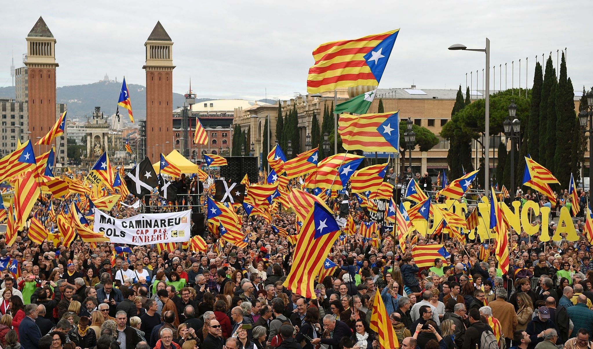 This file photo taken on November 13, 2016 shows pro-independence demonstrators holding flags during a demonstration. (AFP Archive Photo)