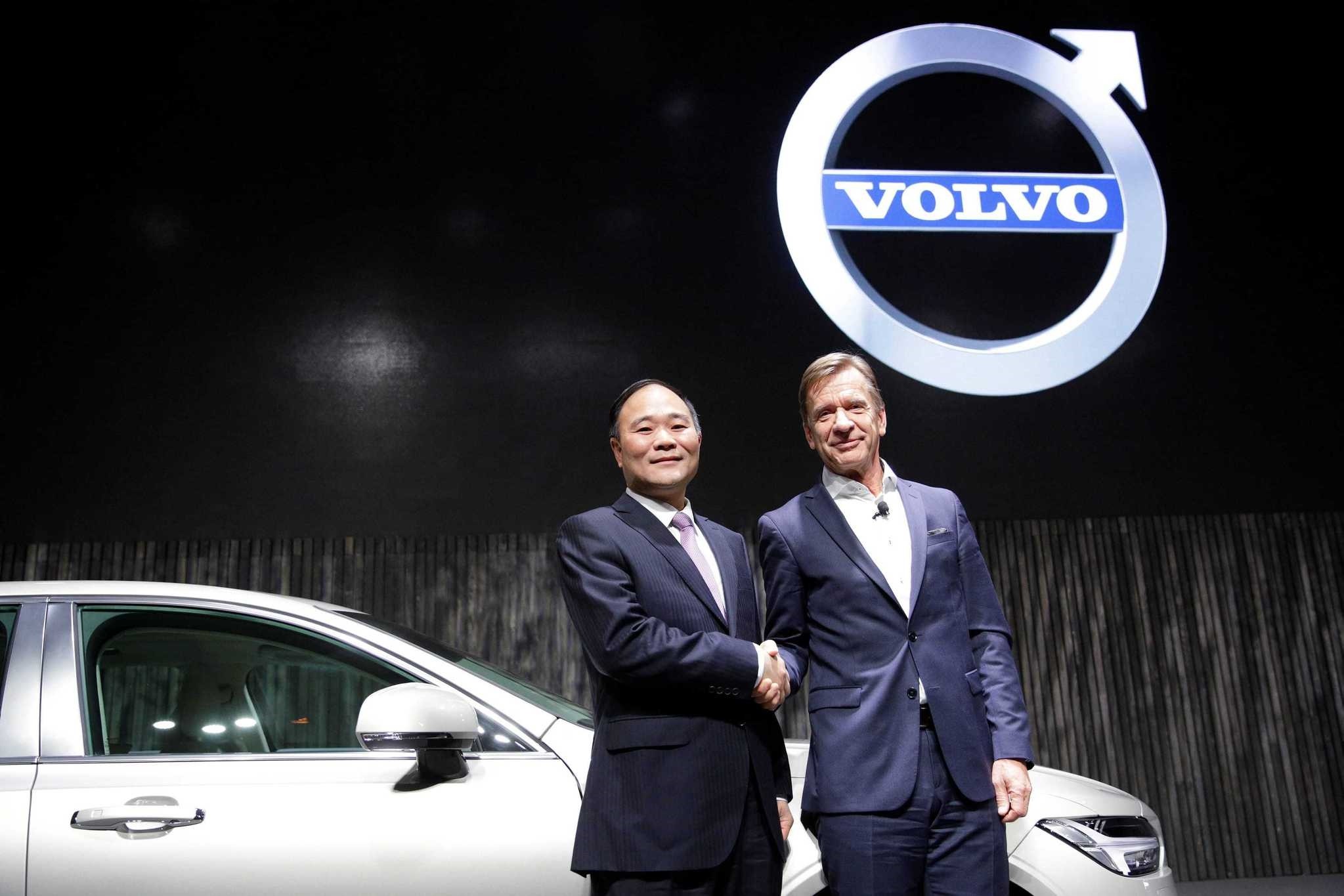 Li Shufu, (L) founder and chairman of Zhejiang Geely Holding Group and Hakan Samuelsson, President of Volvo attend Volvou2019s S90 news conference in Shanghai.