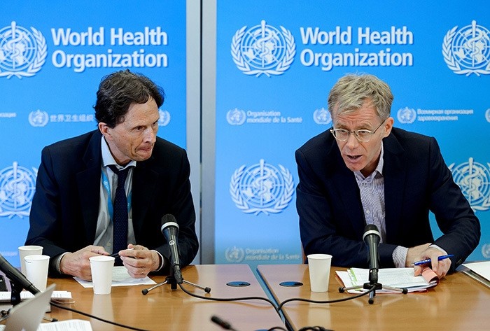 World Health Organization (WHO) Executive Director of the Outbreak and Health Emergencies Cluster Bruce Aylward (R) and Chairman of the World Health Organization (WHO) Emergency Committee, Professor David L. Heymann (AFP Photo)
