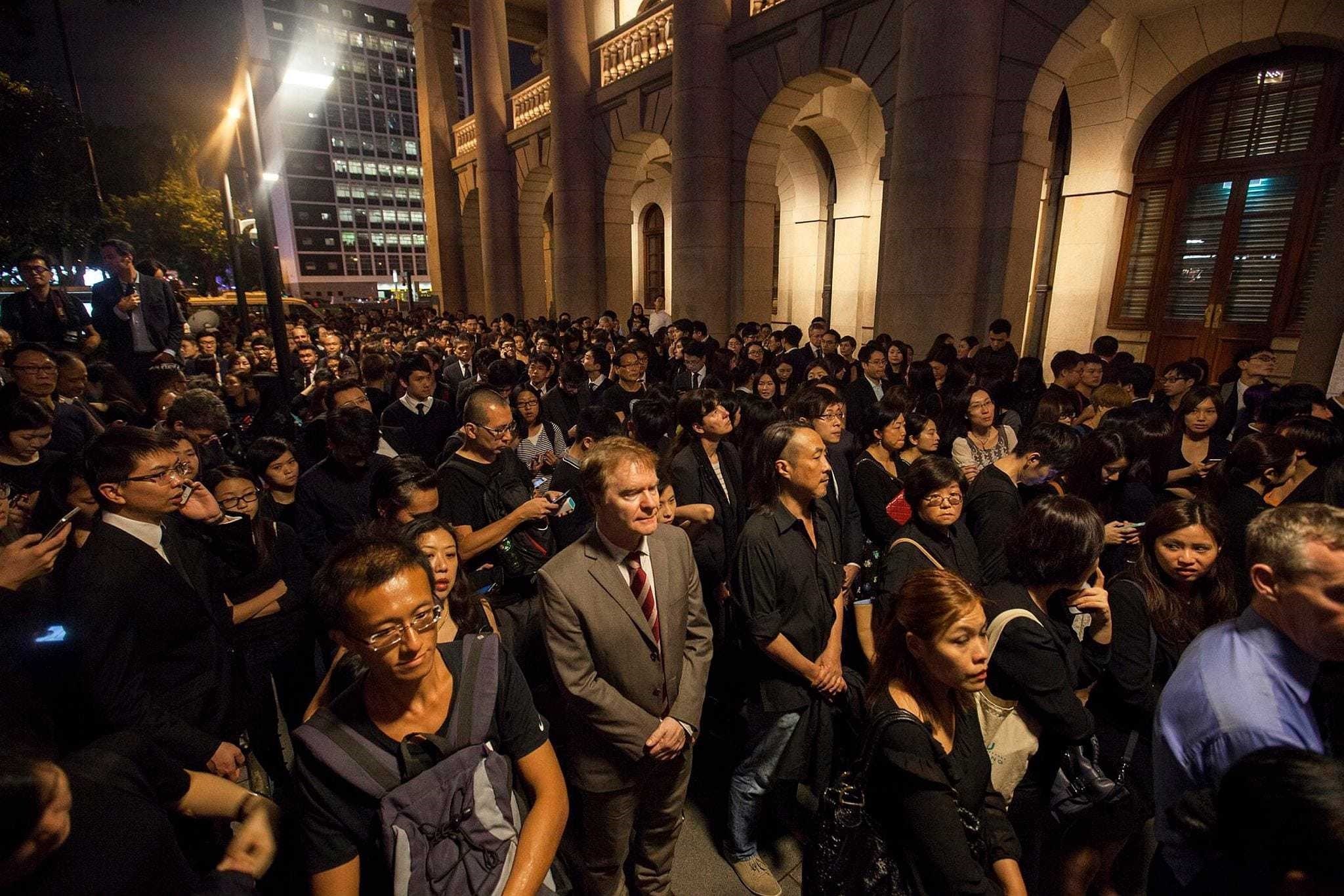 Members of Hong Kongu2019s legal community and law students from the University of Hong Kong gather outside the cityu2019s Court of Final Appeal during a silent protest against China on Nov. 8.