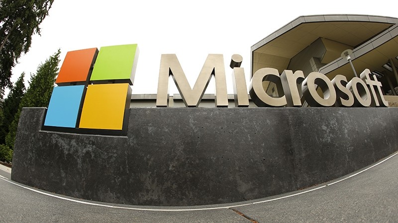 This July 3, 2014, file photo, shows the Microsoft Corp. logo outside the Microsoft Visitor Center in Redmond, Wash. (AP Photo)