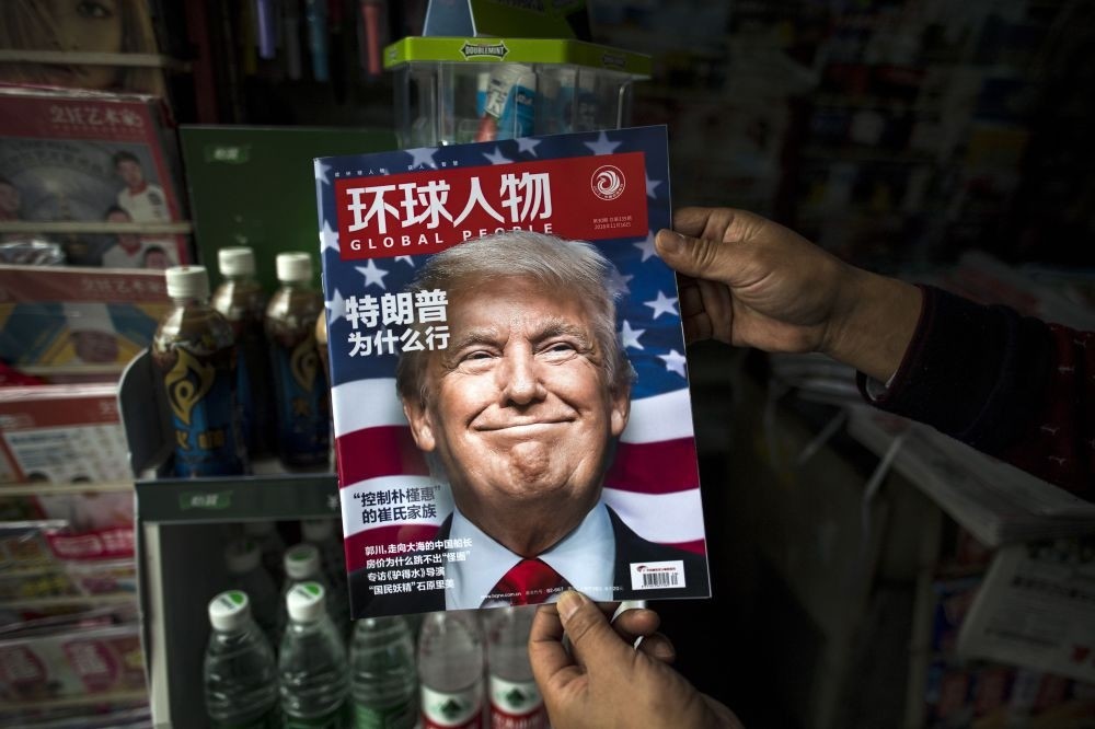 A copy of the local Chinese magazine Global People with a cover story that translates to ,Why did Trump win, at a news stand in Shanghai, Nov. 14, 2016.