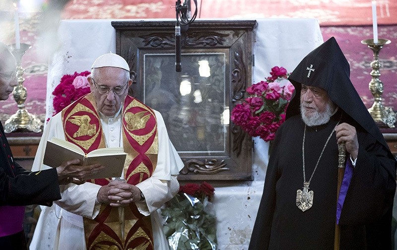 Pope Francis and Catholicos Karekin II visits the Armenian Apostolic Cathedral of the Seven Wounds in Armenia's second-largest city of Gyumri Saturday, June 25, 2016. (AP Photo)