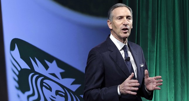 In this Dec. 7, 2016, file photo, Starbucks Chairman and CEO Howard Schultz speaks during the Starbucks 2016 Investor Day meeting in New York. (AP Photo)