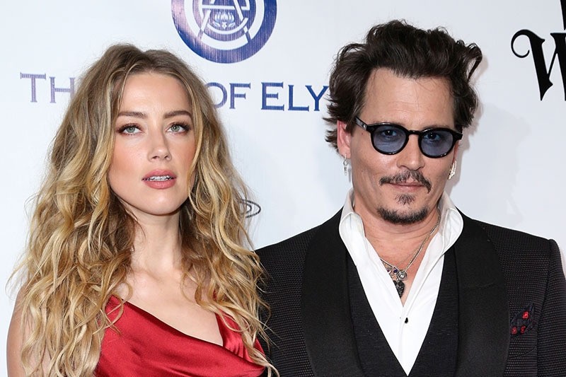 In this Jan. 9, 2016 file photo, Amber Heard, (L), and Johnny Depp arrive at The Art of Elysium's Ninth annual Heaven Gala at 3LABS, in Culver City, Calif. (AP)