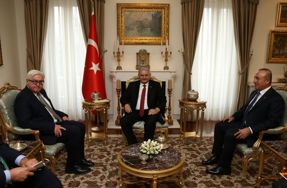 Prime Minister Yu0131ldu0131ru0131m (C), accompanied by Foreign Minister u00c7avuu015fou011flu (R), meets with German FM Steinmeier in Ankara, on Nov. 15, 2016.