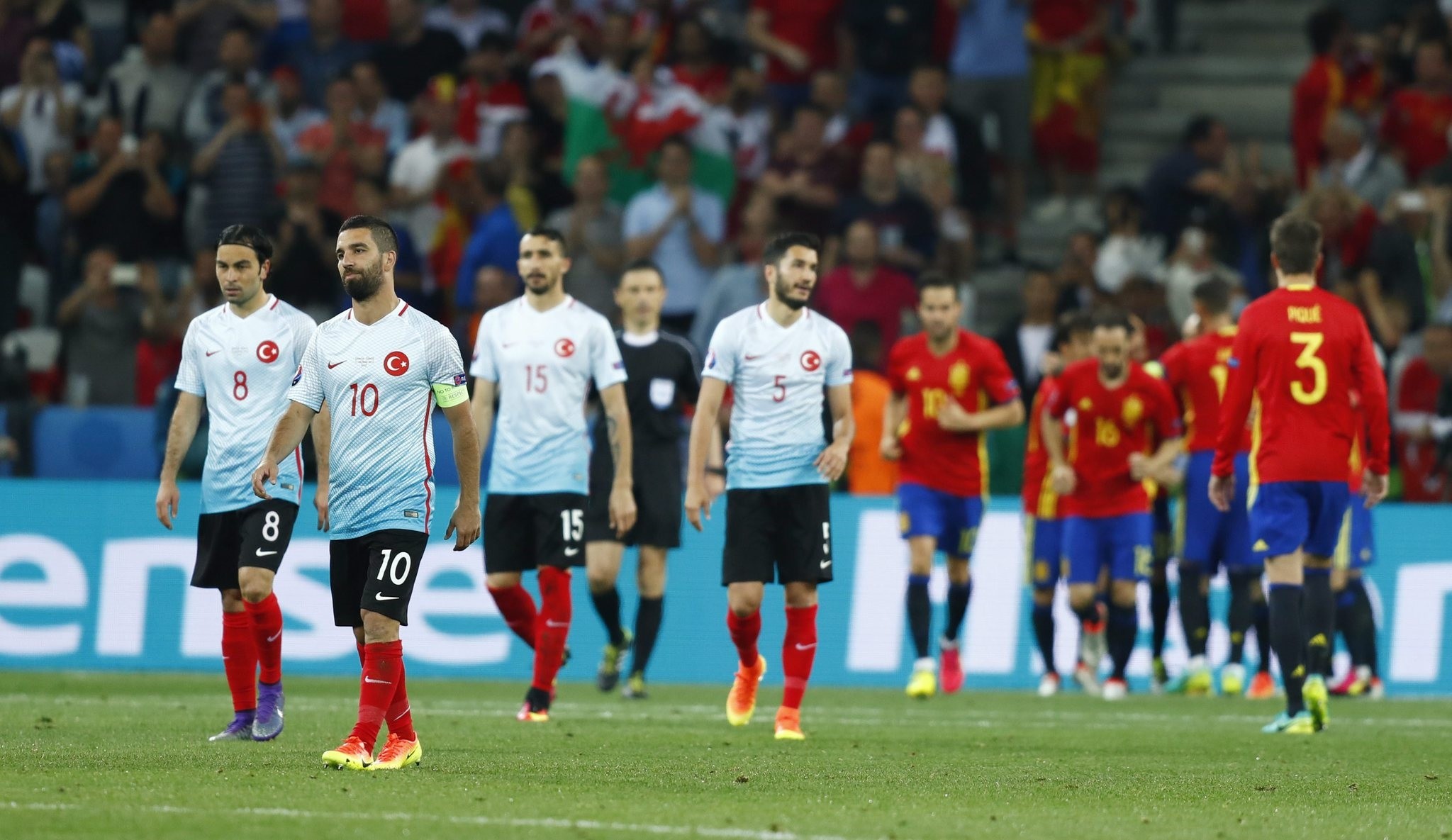 Turkey's Arda Turan reacts after Spain's Alvaro Morata (not pictured) scores their third goal  (REUTERS Photo)