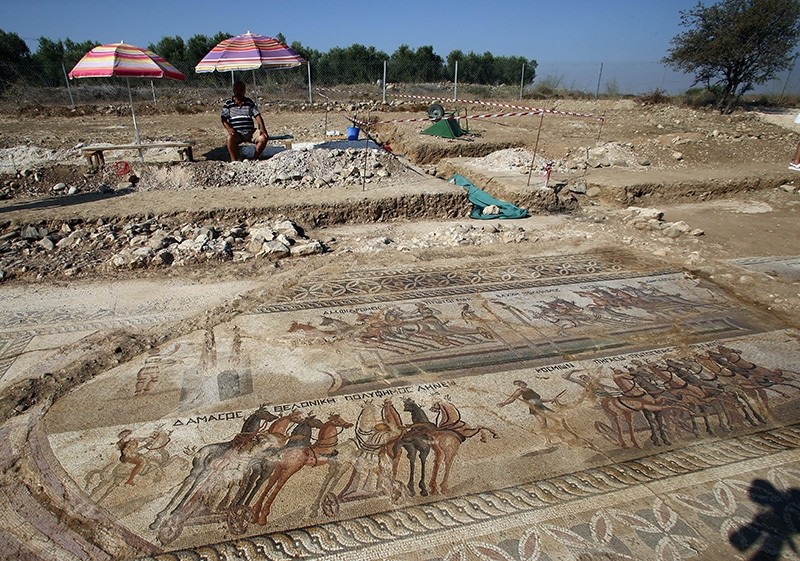 A general view of mosaic floor which depicts a chariot scene taking place in the hippodrome at the Piadhia locality in Akaki village, Nicosia district, Greek Cyprus, August 09, 2016. (EPA Photo)