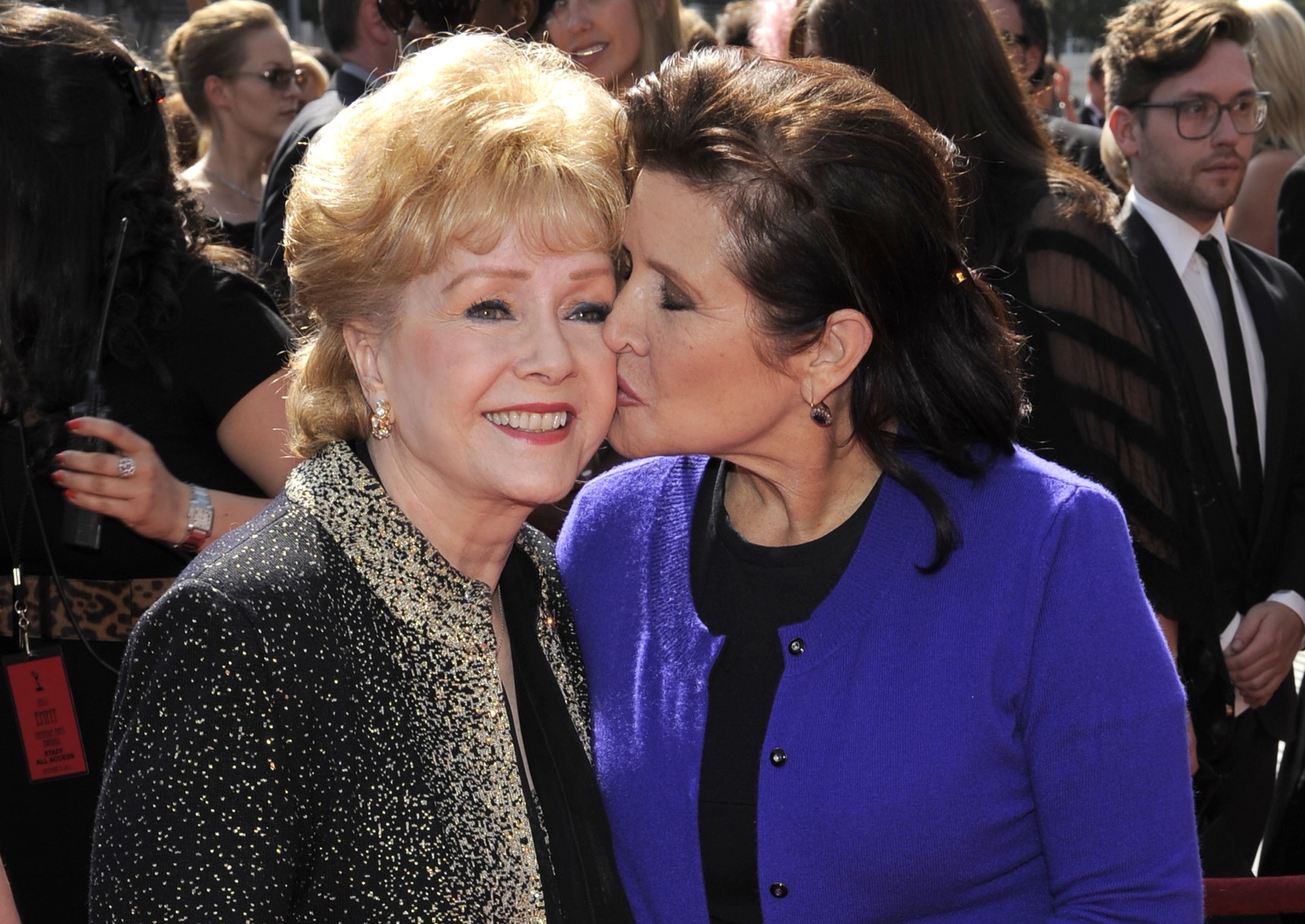 In this Sept. 10, 2011, file photo, Debbie Reynolds, left, and Carrie Fisher arrive at the Primetime Creative Arts Emmy Awards in Los Angeles. (AP Photo)