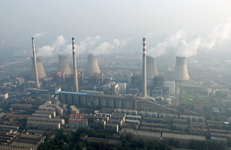 An aerial view shows a coal-burning power plant on the outskirts of Zhengzhou, Henan province, China, August 28, 2010. (Reuters Photo)