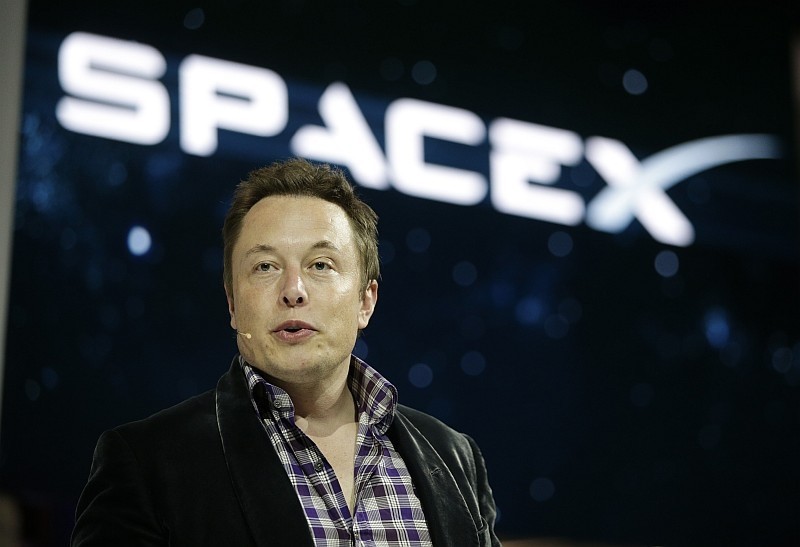 Elon Musk, CEO and CTO of SpaceX, introduces the SpaceX Dragon V2 spaceship at the SpaceX headquarters in Hawthorne, California. (AP Photo)