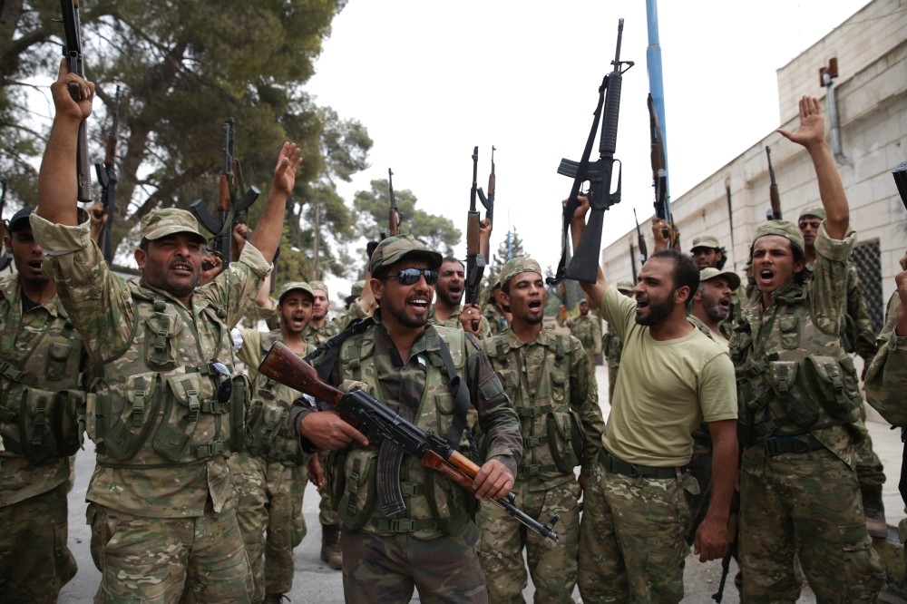 Turkey-backed FSA fighters jubilant after liberating Jarablus from DAESH terrorists.