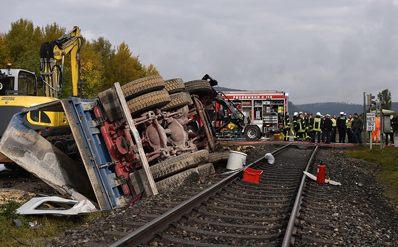 The wreckage of a truck lies next to rail tracks near Koenigsbronn, southwestern Germany, Friday, Oct. 21, 2016 (AP Photo)
