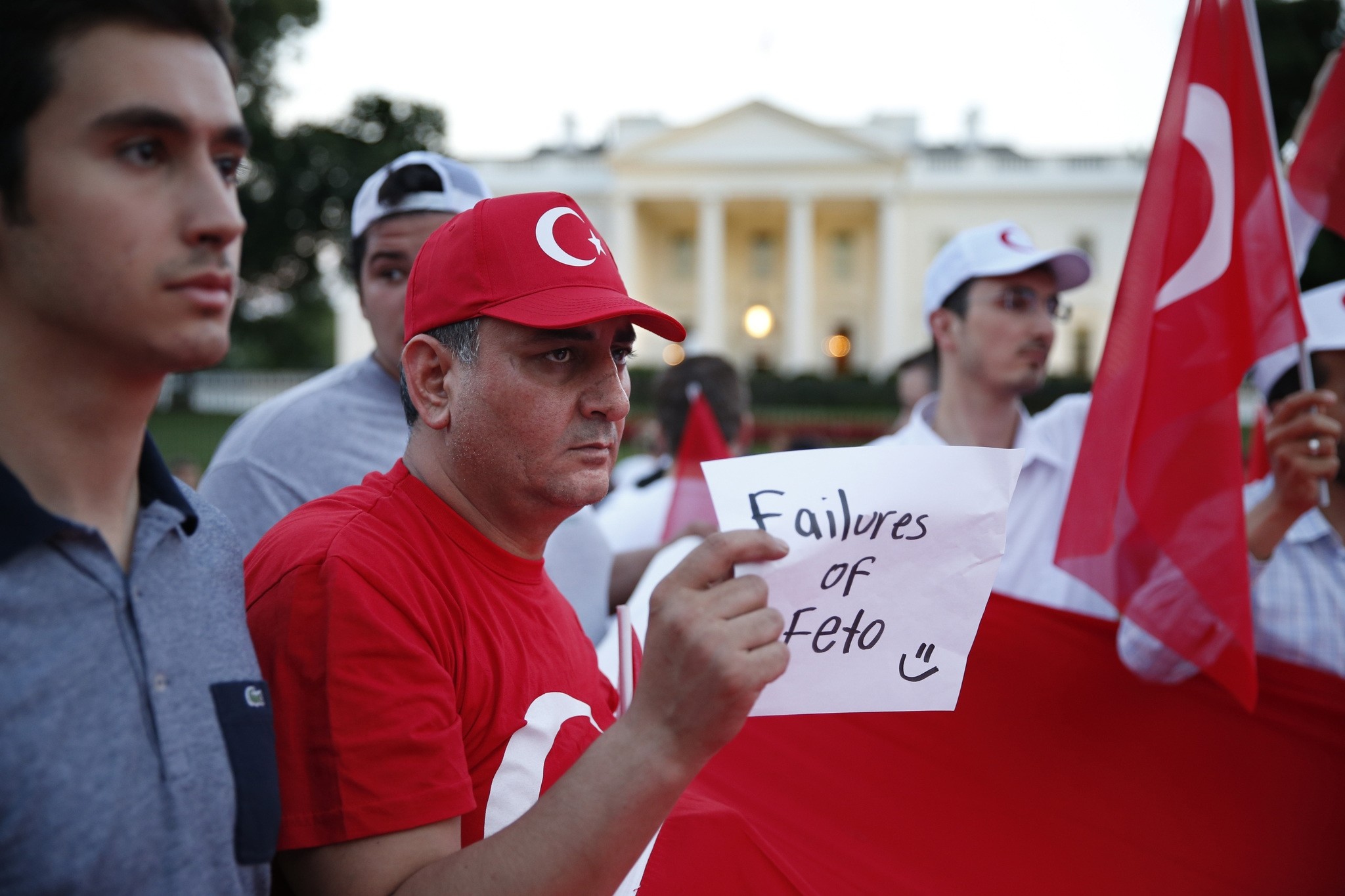 Demonstrators with Turkish flags at a demonstration against the failed attempted coup in Turkey, outside the Turkish embassy in Berlin, Germany, 16 July 2016.