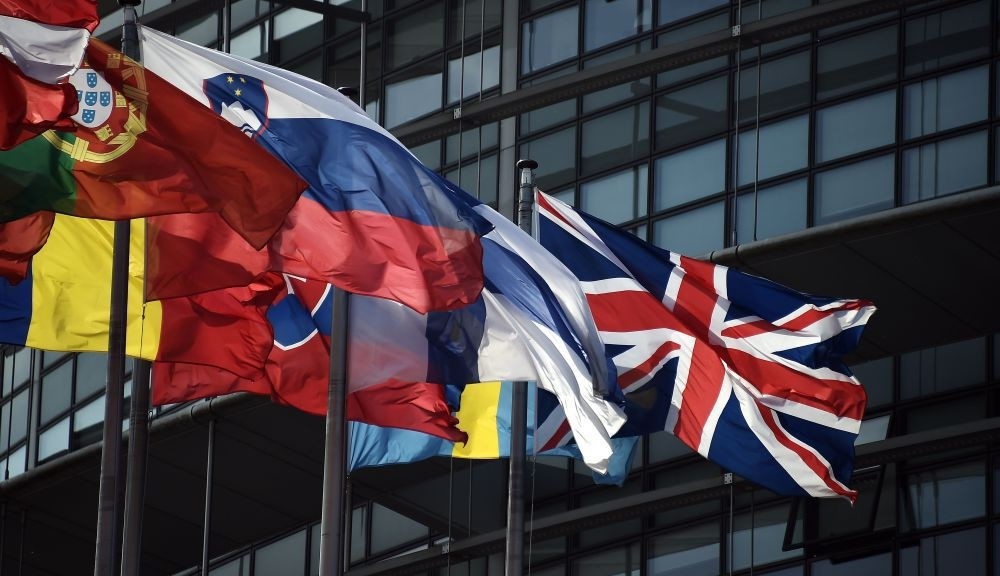 The British Union Jack (R) flies among European Union member countries' national flags in front of European Parliament in Strasbourg, France, June 9.