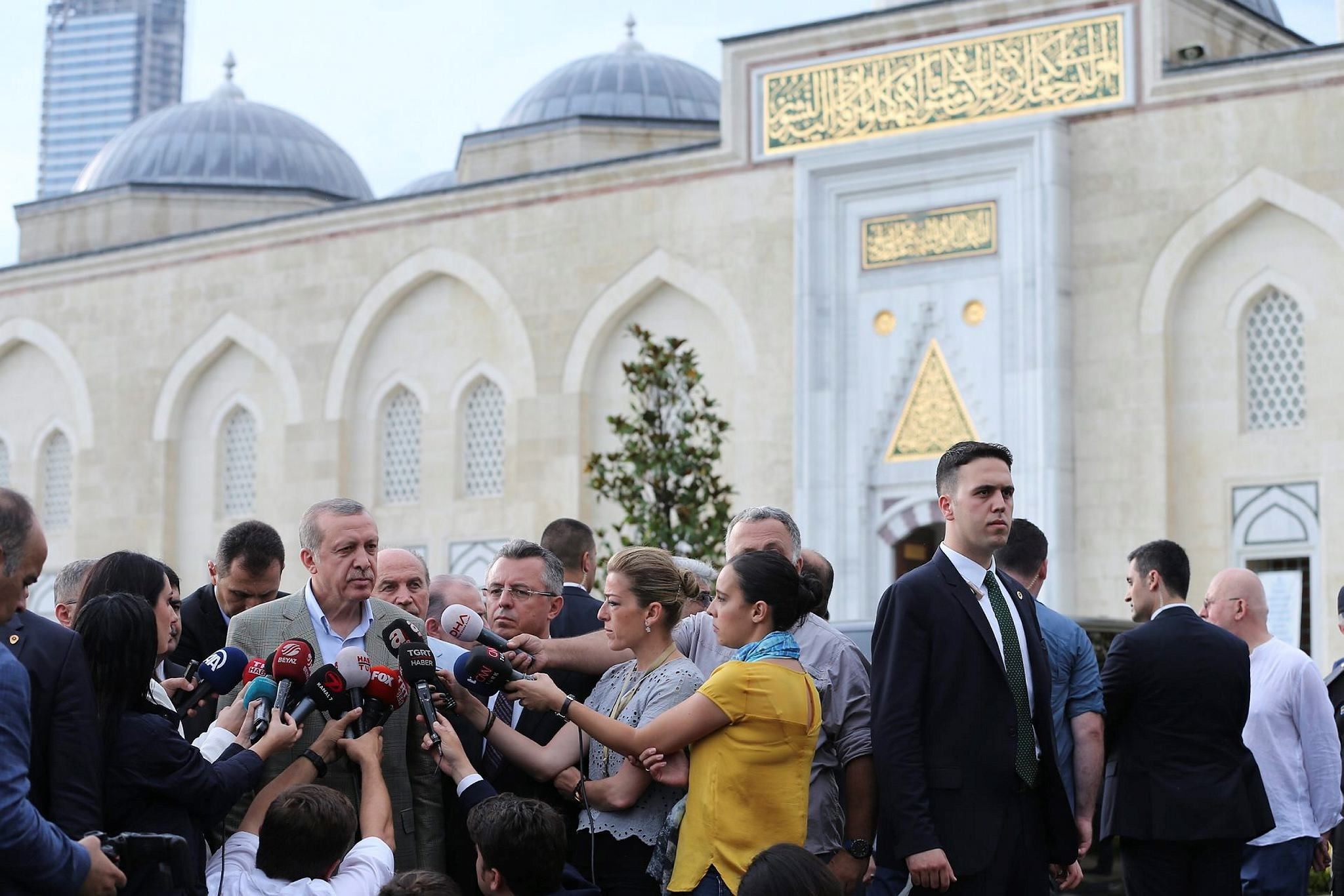 President Erdou011fan speaks to reporters after e Eid al-Fitr prayer at Atau015fehir Mimar Sinan Mosque in Istanbul on July 5, 2016. (AA photo)