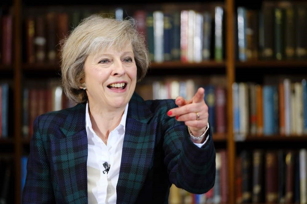British Interior Minister Theresa May addresses a press conference in central London on June 30.