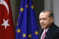President Erdou011fan waits for the arrival of European Council President Tusk prior to a meeting in Brussels, Oct. 5.