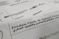 In this Tuesday, Aug. 16, 2016 photo, a selection of private medical files published by transparency website WikiLeaks is shown in Paris (AP Photo)