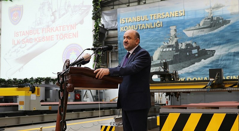 Defense Minister Fikri Iu015fu0131k speaks during the first welding ceremony of Istanbul frigate. (IHA Photo)