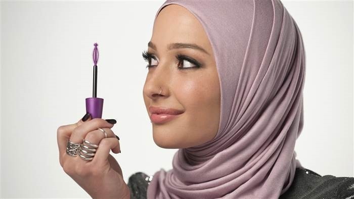 In this undated photo provided by CoverGirl, beauty blogger Nura Afia poses for a photo. (CoverGirl via AP)