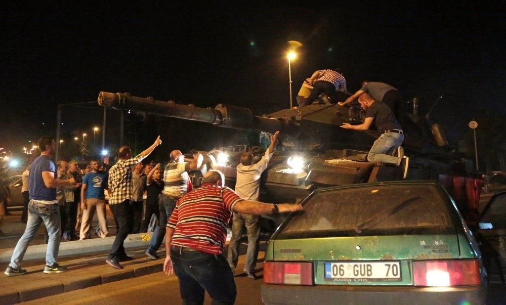 Civilians try to stop tanks commanded by pro-coup troops on July 15 in the capital Ankara.