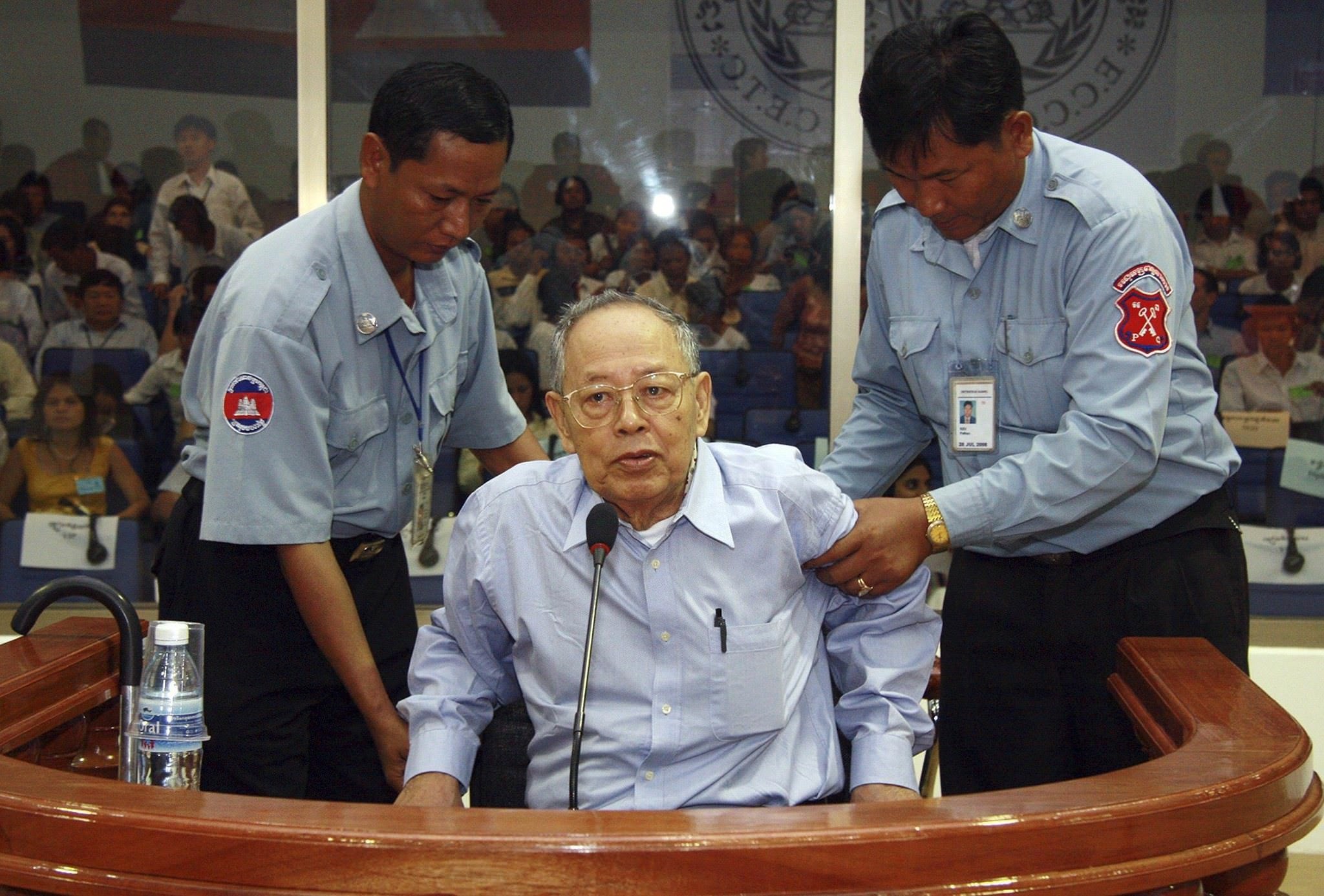 Former Khmer Rouge foreign minister Ieng Sary is assisted during his pre-trial hearing at the Extraordinary Chambers in the Courts of Cambodia (ECCC) in the outskirts of Phnom Penh in this June 30, 2008 file photo. (Reuters Photo)