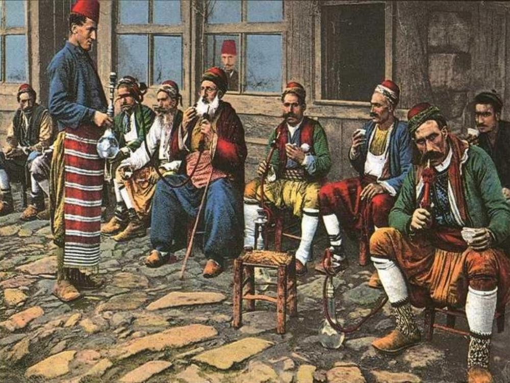 A group of men enjoying hookah at a local Ottoman-era coffeehouse.