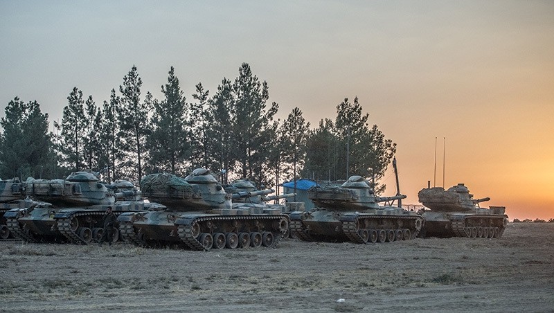 This photo dated Aug. 27, 2016, shows Turkish tanks deployed near the Syrian border are waiting at the Turkish side of the border. (AA Photo)