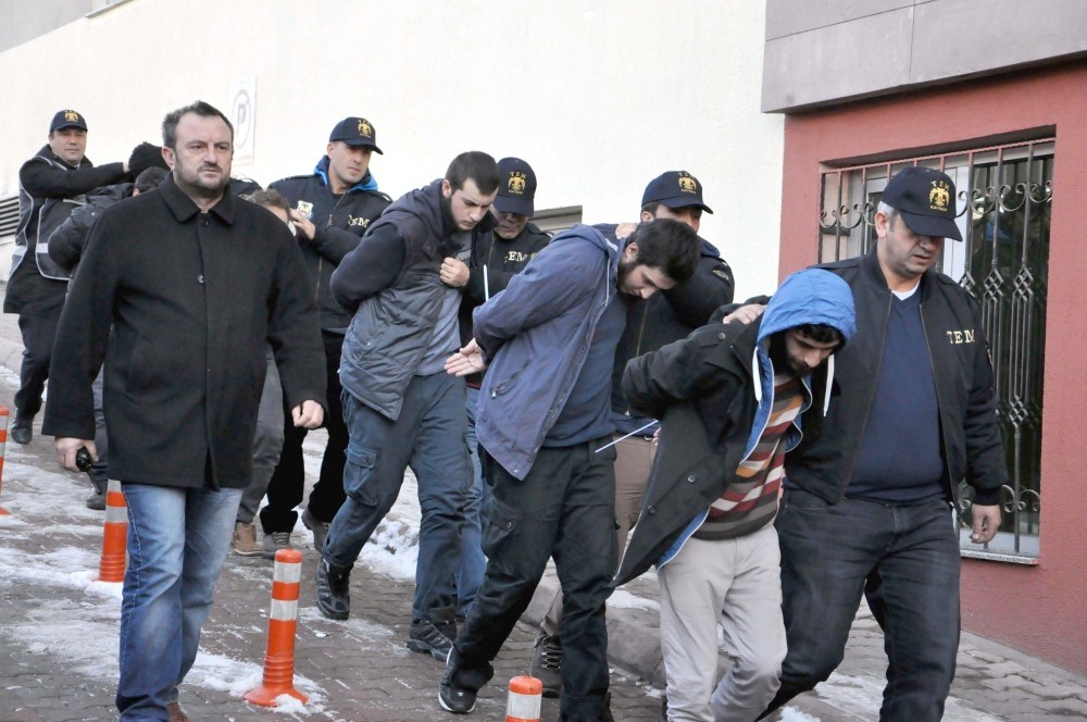 Police escort Daesh suspects to the courthouse in central city of Kayseri.