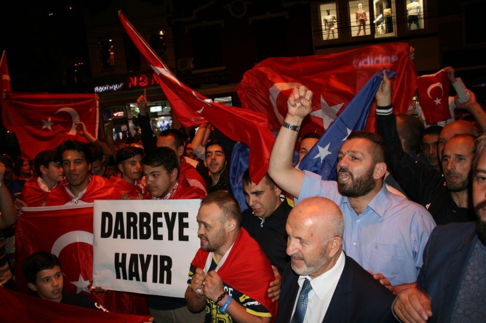Turks and Albanians in Kosovo stage an anti-coup protest with Turkish flags.