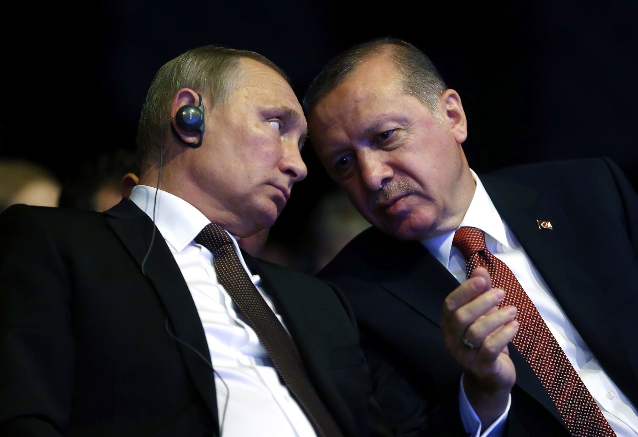 This file photo taken on October 10, 2016 show President Erdogan (R) talking with Putin during the opening ceremony of the 23rd World Energy Congress.