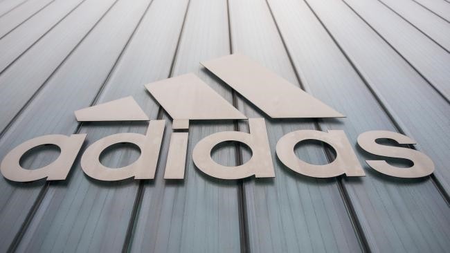 Adidas is ending its commercial agreement with the governing body of athletics three years early. (AFP Photo)