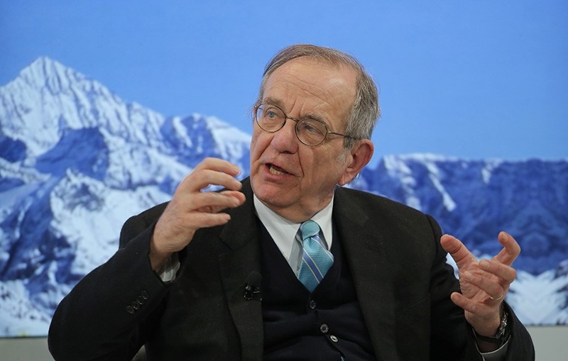 Italy's Finance Minister Pier Carlo Padoan attends a panel on the second day of the annual meeting of the World Economic Forum in Davos (AP Photo)