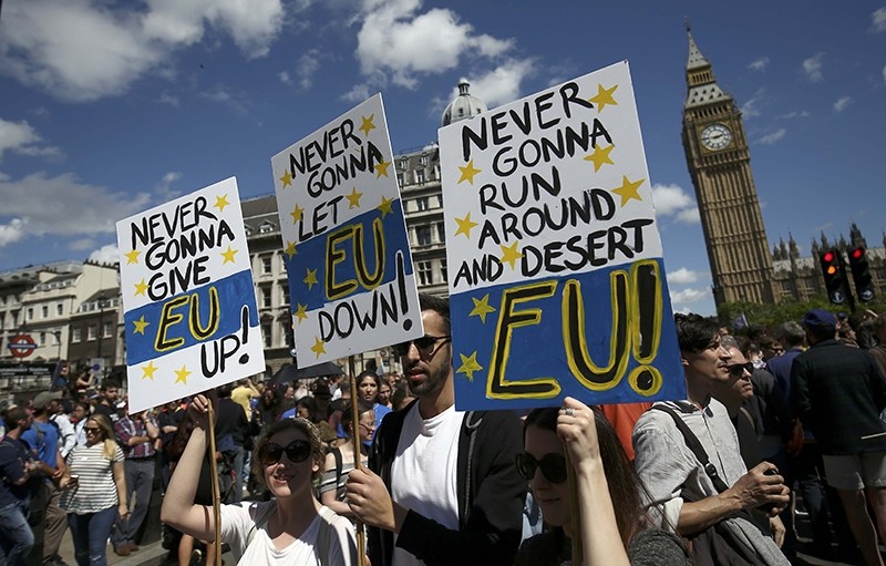 People hold banners during a 'March for Europe' demonstration against Britain's decision to leave the European Union, in central London, Britain July 2, 2016. (REUTERS Photo)