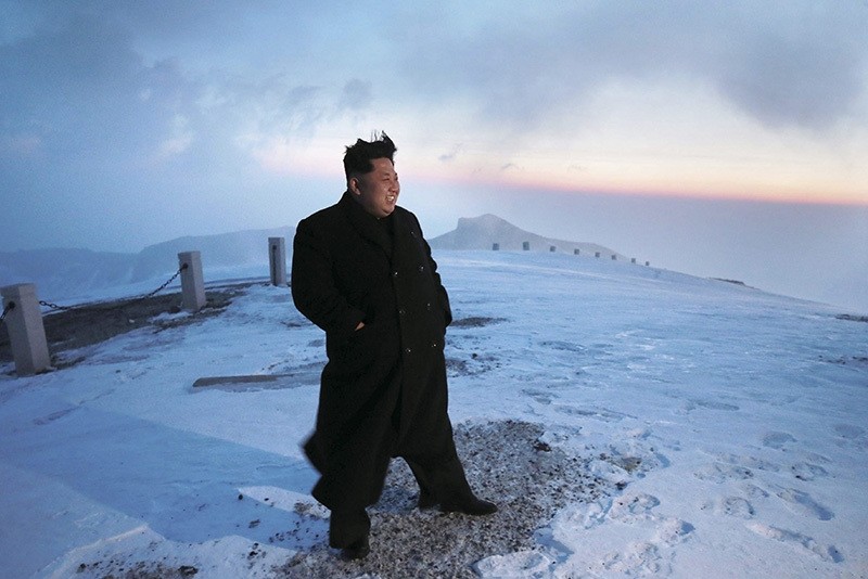 A picture made available on 19 April 2015 by the Korean Central News Agency (KCNA) shows North Korean leader Kim Jong-un posing for a photo on Mount Paekdu, the highest mountain on the Korean Peninsula, April 18, 2015. (EPA Photo)