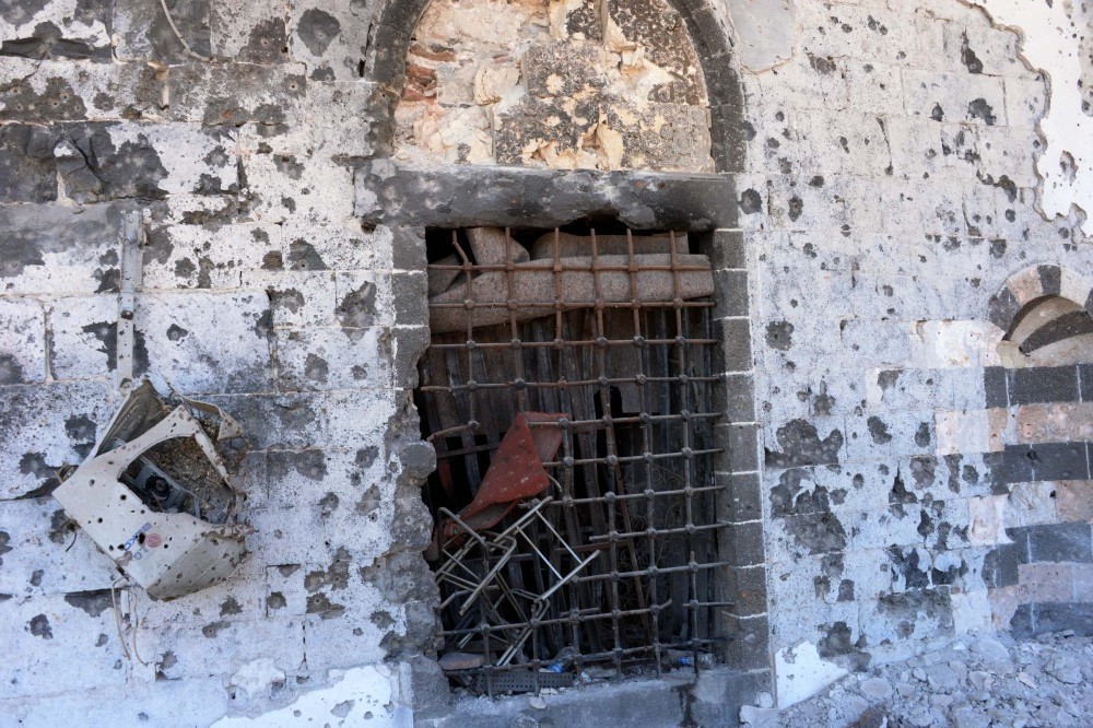 This photo shows damaged walls and a broken window of the historical Kuru015funlu Mosque in Sur district of the majority Kurdish southeastern city of Diyarbaku0131r, May 31.