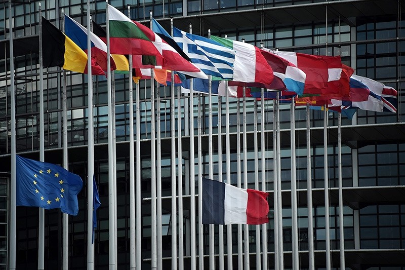 This photo taken on July 15, 2016 shows the French and European Union flags flying at half-mast in front of the European Parliament (AFP Photo)