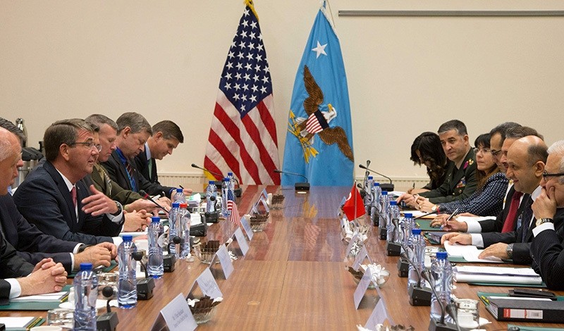 Defense Minister Fikri Iu015fu0131k (2ndR) speaks with US Secretary of Defense Ash Carter (3rdL) during a meeting at NATO headquarters in Brussels on June 14, 2016 (AFP Photo)