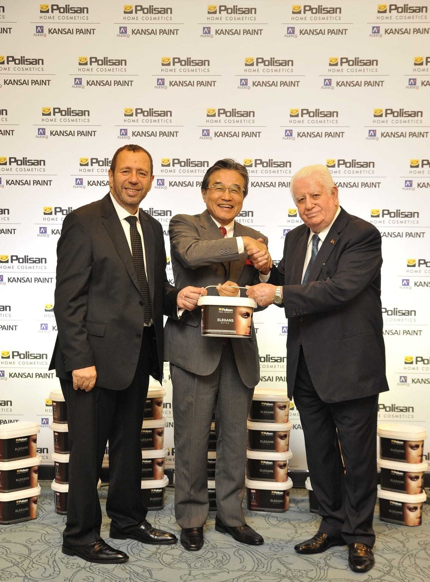 CEO of Polisan Holding Erol Mizrahi (L), Kansai Paint President Hiroshi Ishino (C) and Chairman of the Board of Polisan Holding Necmettin Bitlis (R) celebrates the new deal signed as Kansai Paint took over 50 percent of Polisan shares.