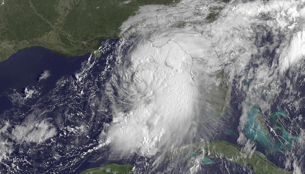 The satellite image taken at 9:15 a.m EDT, on Thursday, Sept. 1, 2016, and release by NOAA shows Tropical Storm Hermine gathering strength in the Gulf of Mexico. (DOAA via AP)
