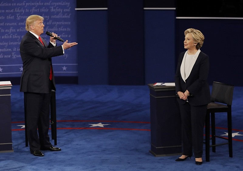 Donald Trump speaks to Hillary Clinton during the second presidential debate at Washington University in St. Louis, Oct. 9, 2016. (AP Photo)